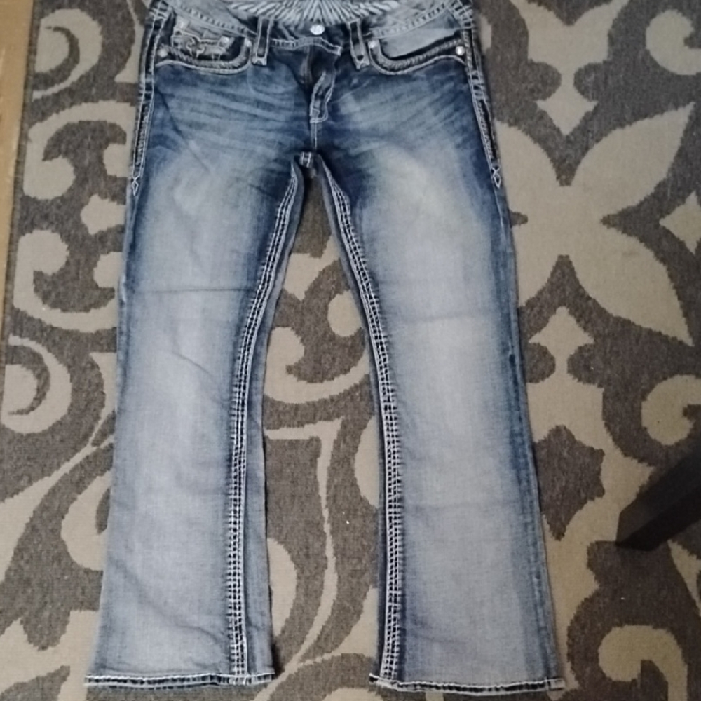 Rock Revival Blue Jeans with Distinctive Stitching